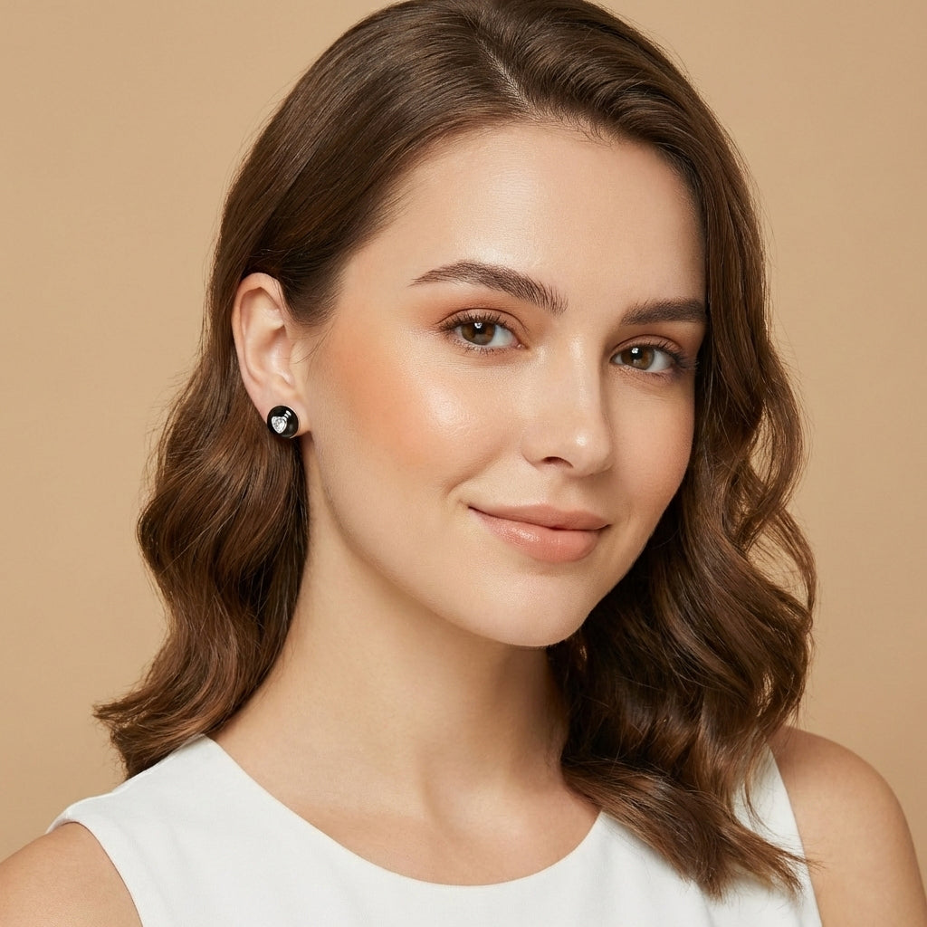 The onyx heart studs in 925 silver