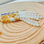 Load image into Gallery viewer, Life Of A Bird Rotating Pearl Chain Necklace
